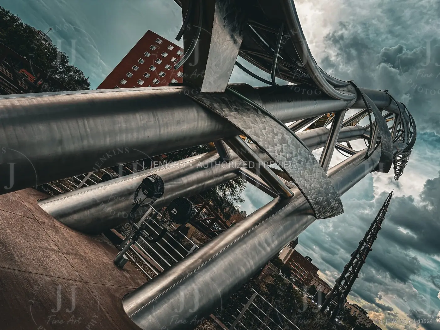 Low-angle view of a sweeping steel public sculpture