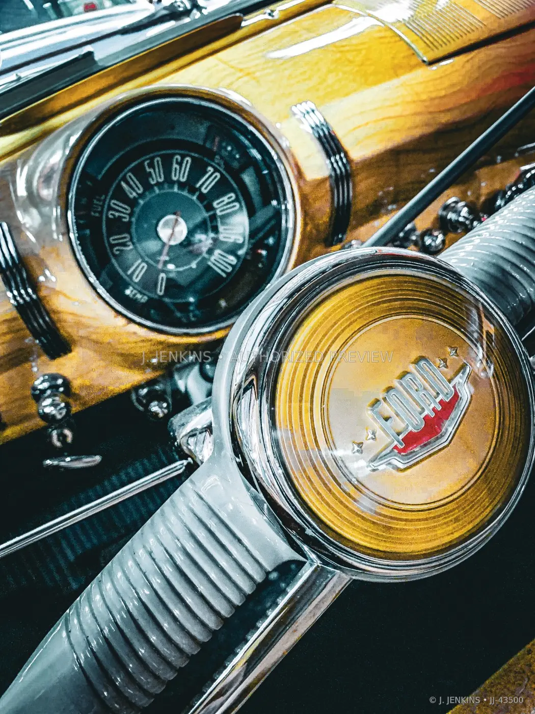 Vintage Ford steering wheel and amber dashboard